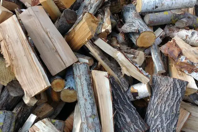 do you stack firewood bark up or down