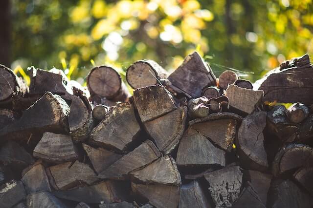 do you stack firewood bark up or down